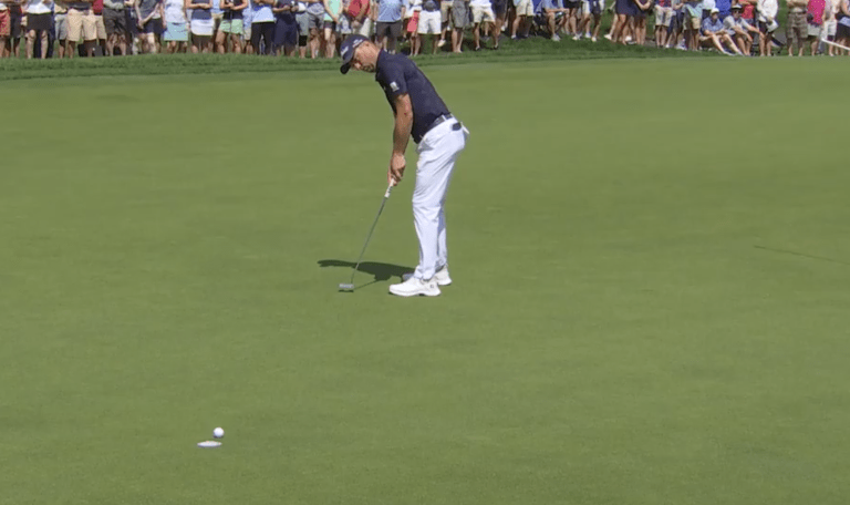 Justin Thomas watches his birdie putt roll toward the cup on par-4 second hole during Travelers Championship Round 2