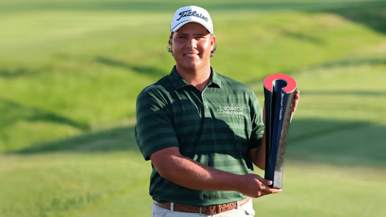 Aldrich Potgieter holds the Rocket Classic trophy after winning in a playoff