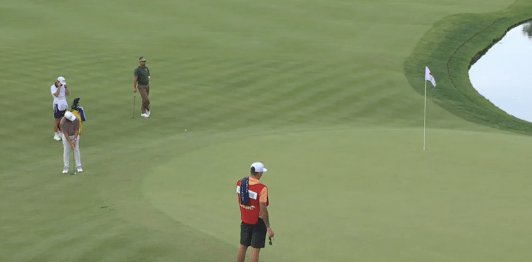 Tommy Fleetwood putts from off the green for eagle on the 13th hole during Travelers Championship Round 3