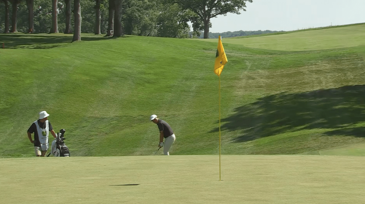 Doug Ghim chipping from off the green on the 5th hole during Round 2 of the John Deere Classic
