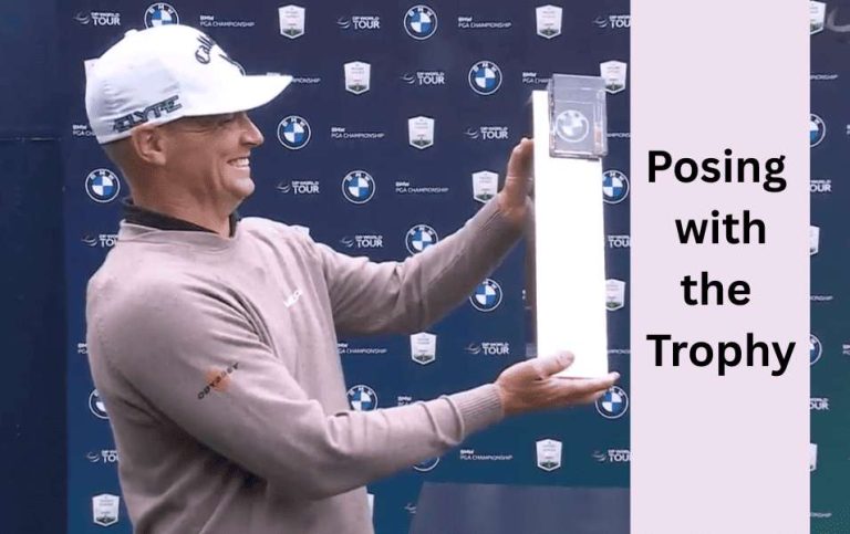 Alex Noren celebrates with the record BMW PGA Championship payout and trophy at Wentworth 2025