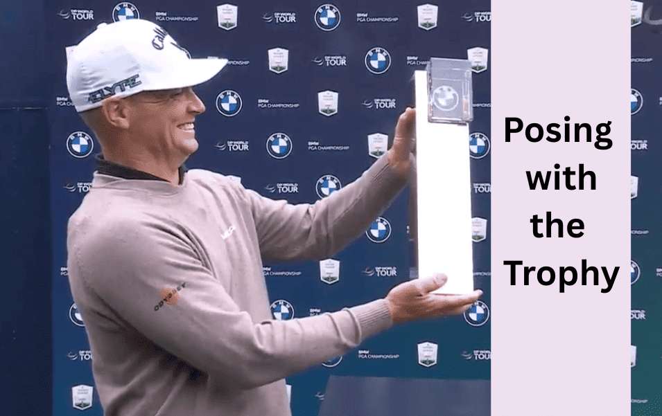 Alex Noren celebrates with the record BMW PGA Championship payout and trophy at Wentworth 2025