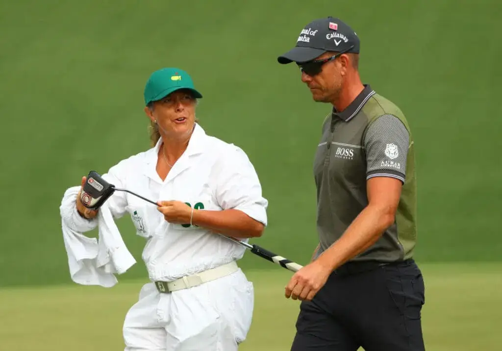 Fanny Sunesson caddying for Henrik Stenson at the Masters